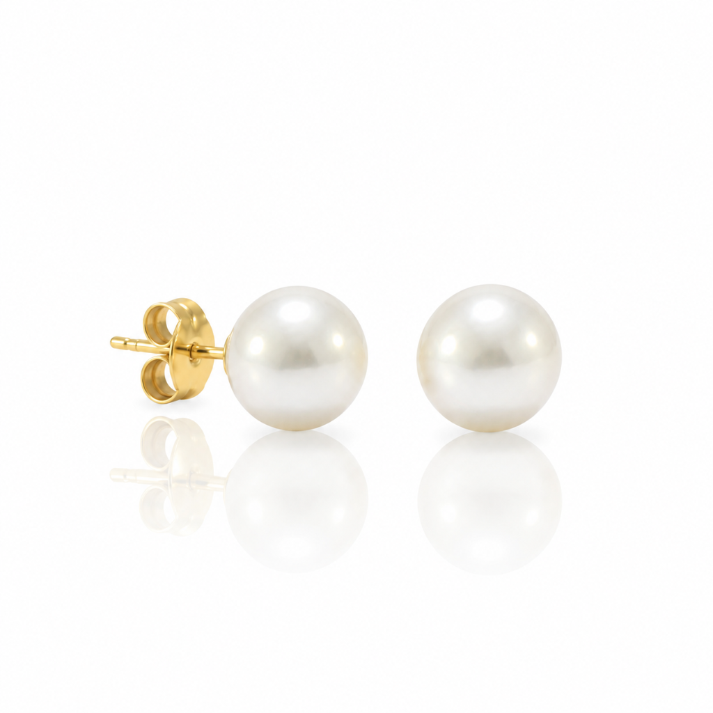 Pendientes de perla Australiana con pernio y presión en oro amarillo de 18 kt.