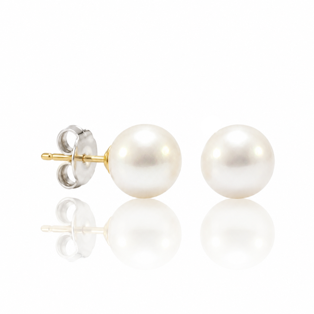 Pendientes de perla cultivada con pernio en oro amarillo y presión en oro blanco de 18 kt.