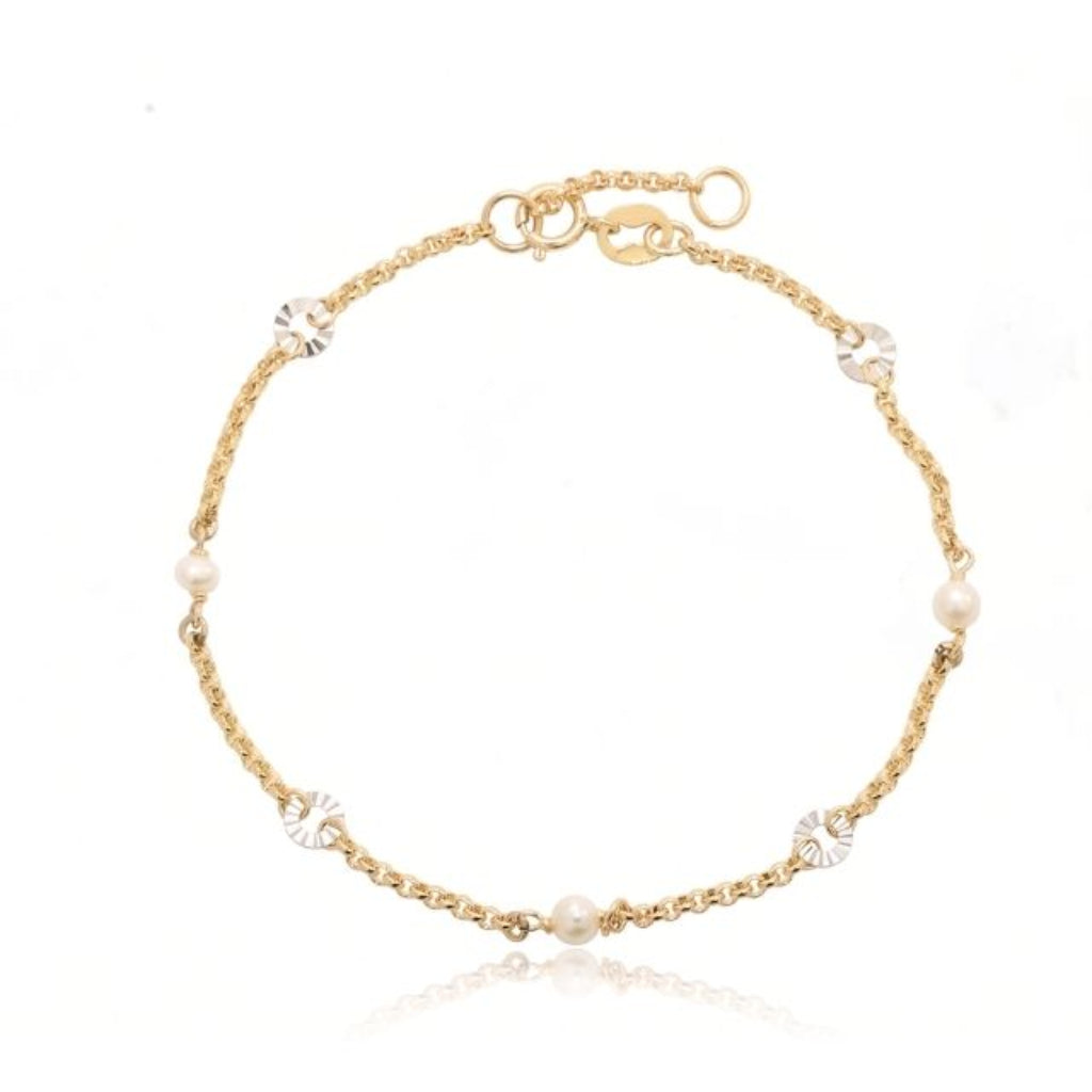Pulsera de oro amarillo de 18 quilates con perlas y motivos circulares facetados de oro blanco.