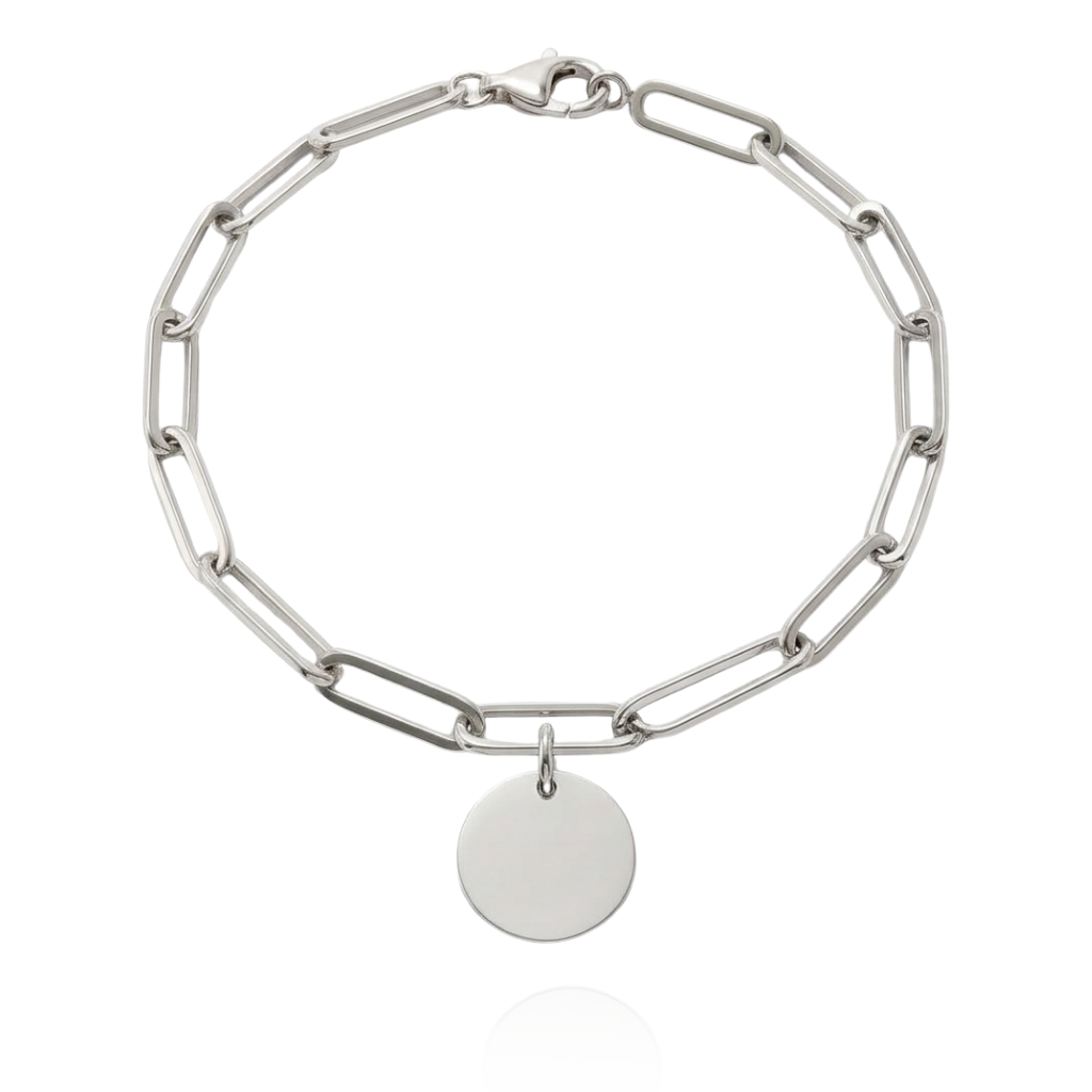 Pulsera realizada en plata de primera ley (925) compuesta por eslabones alargados y una chapa circular colgante.