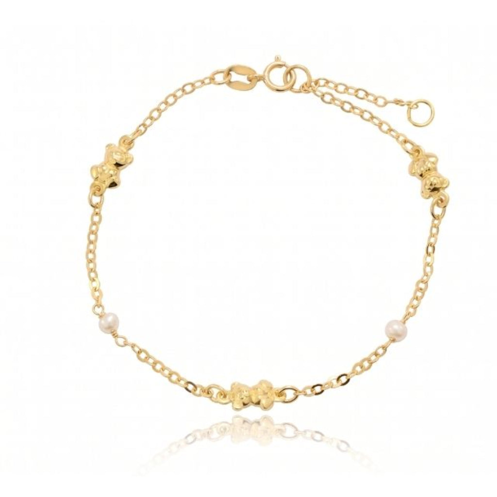 Pulsera de oro amarillo de 18 quilates con ositos y perlas cultivadas.