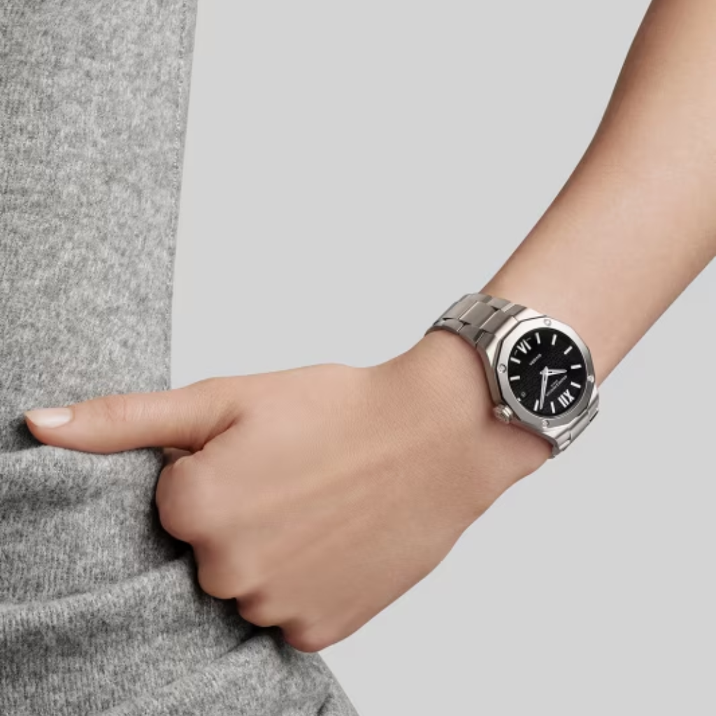 Reloj para mujer Baume &amp; Mercier con brazalete de acero y esfera negra con fecha y diamantes Swiss Made