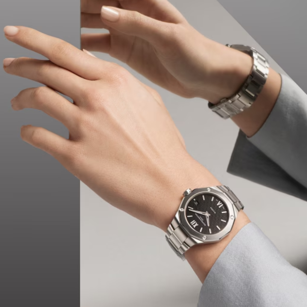 Reloj para mujer Baume & Mercier con brazalete de acero y esfera negra con fecha y diamantes Swiss Made