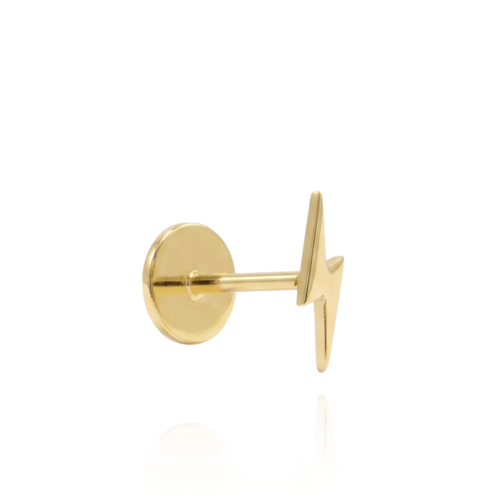 Piercing realizado en oro de 18 quilates. 