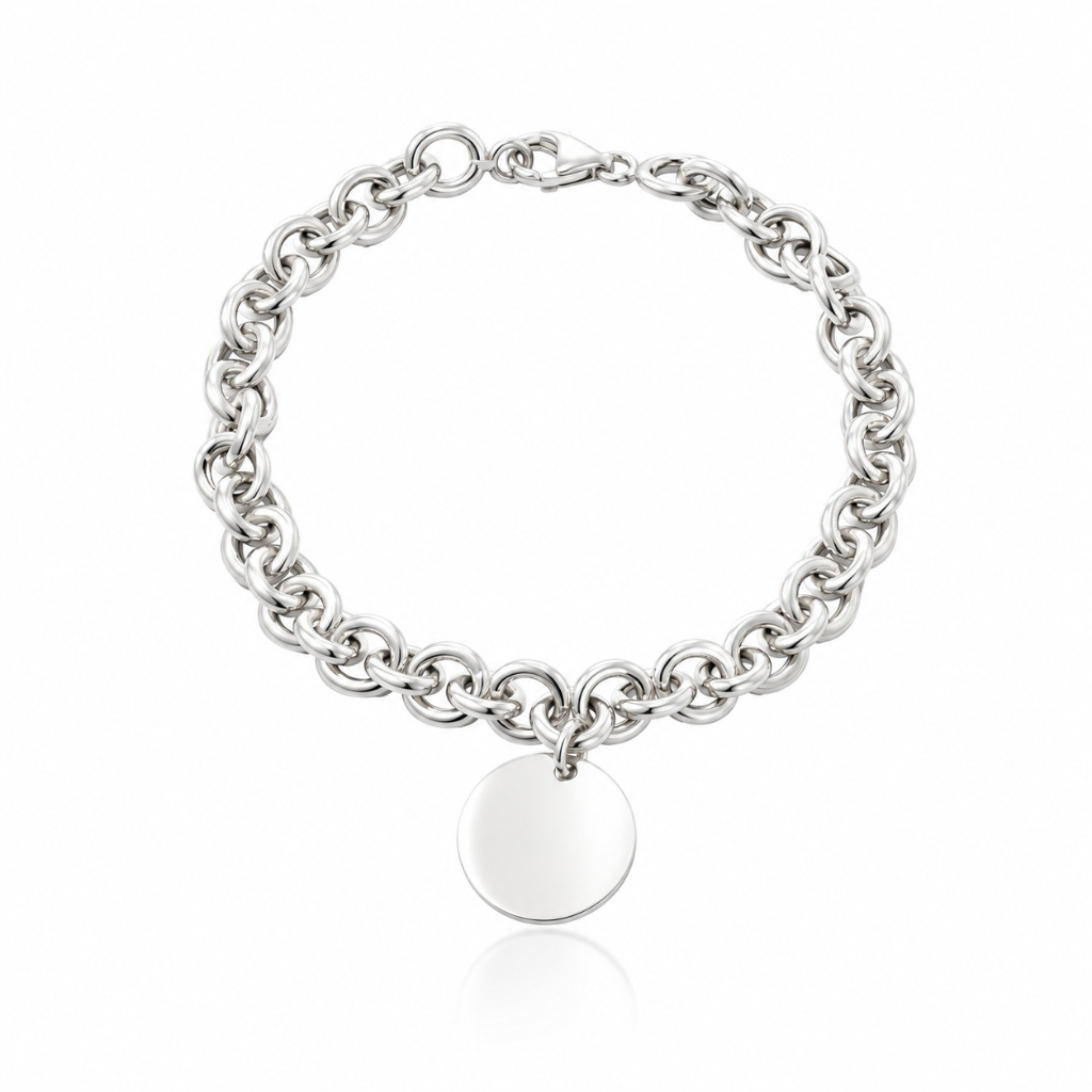 Pulsera realizada en plata de primera ley (925) compuesta por eslabones entrelazados y una chapa circular colgante.
