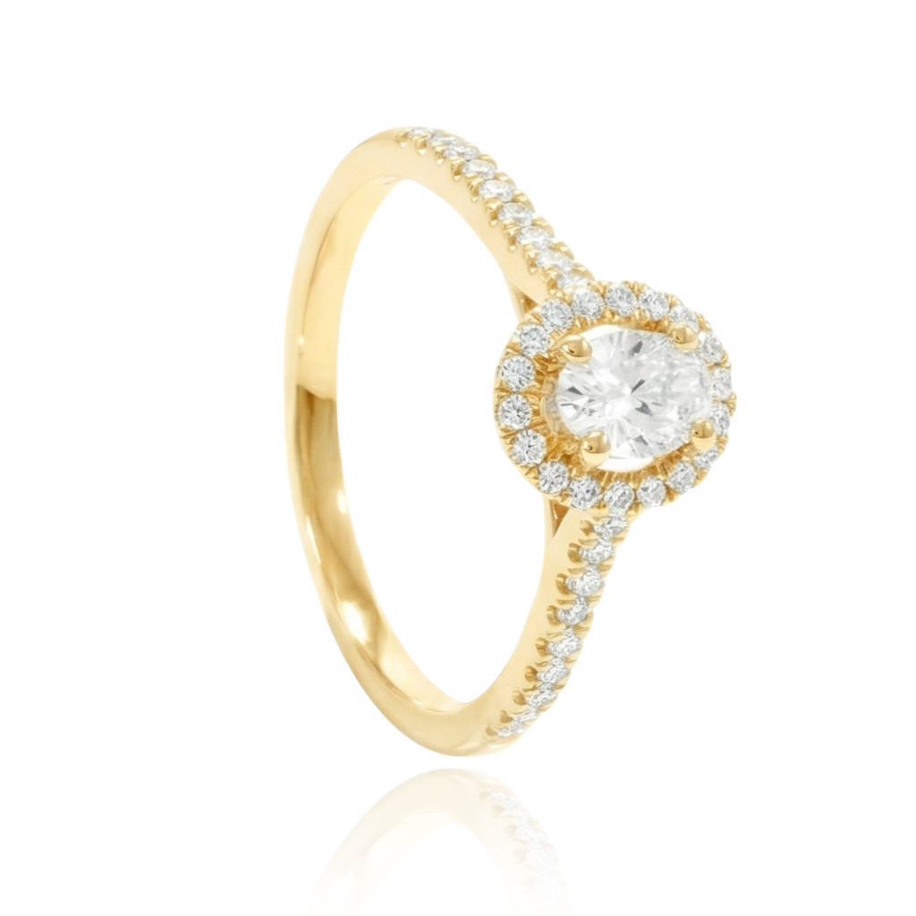 anillo de compromiso en oro amarillo de 18 quilates con diamante, orla de diamantes y diamantes en los laterales