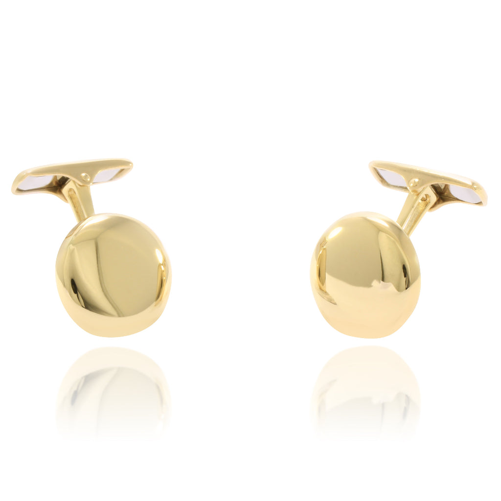 Gemelos para camisa redondos realizados en oro amarillo de 18 quilates.