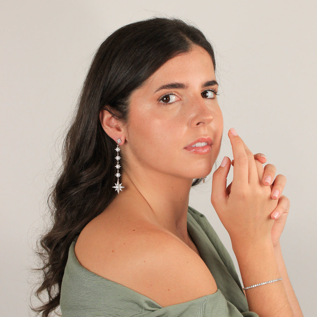 Pendientes largos de estrella en plata de primera ley con circonitas