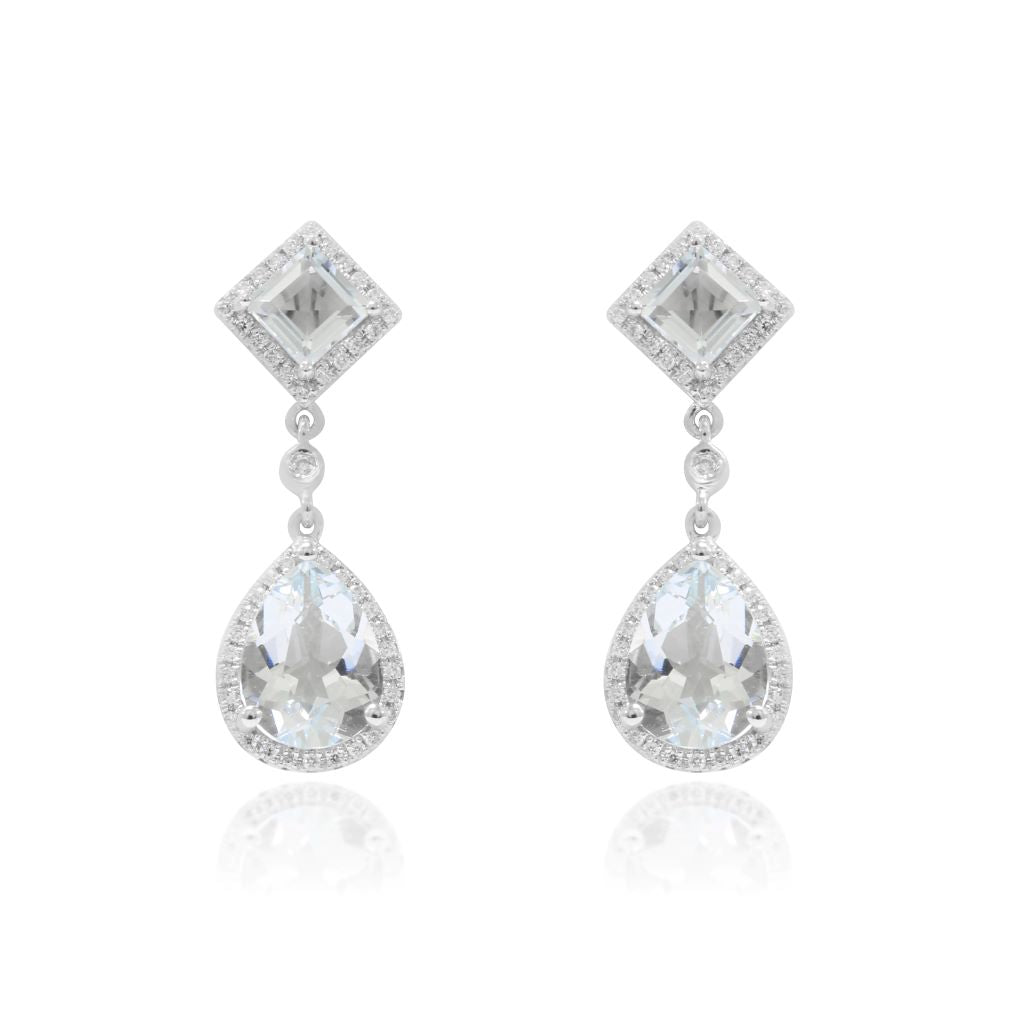 Pendientes realizados en oro de 18 quilates con diamantes y aguamarina. Joyería Pamplona