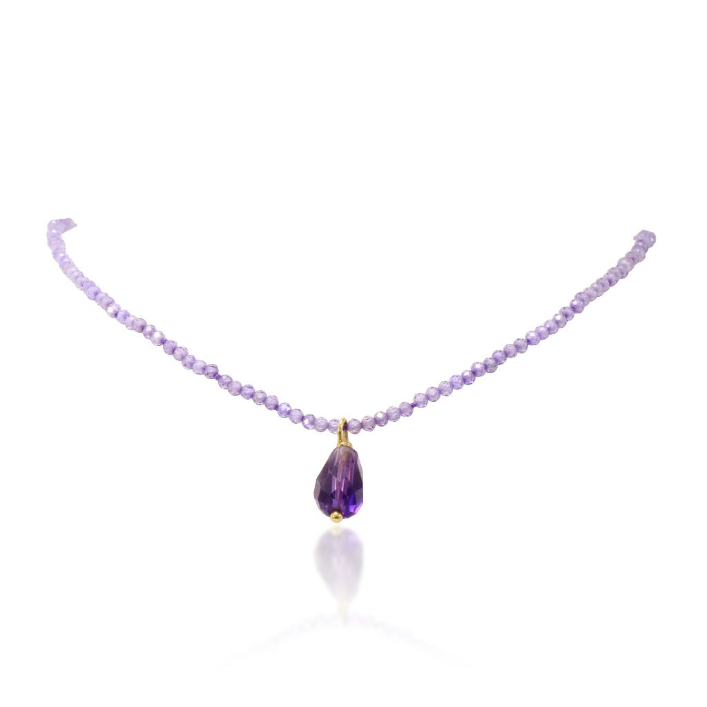 Gargantilla de cuarzo hidrotermal violeta y oro amarillo de 18 quilates. Joyería Pamplona.