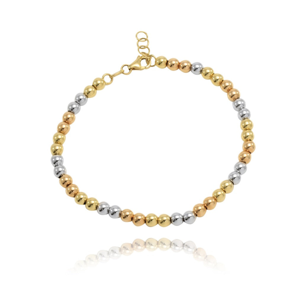 Pulsera esferas tricolor