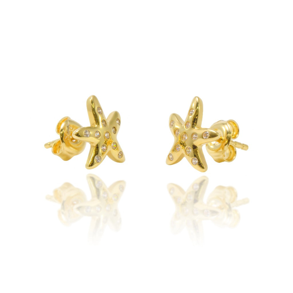 Pendientes en oro amarillo de 18 quilates, forma estrella de mar con circonitas. Joyería Pamplona.