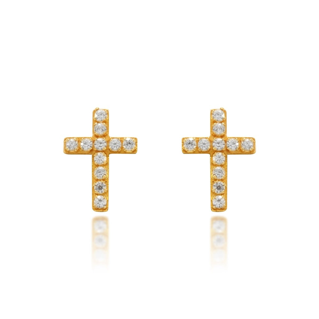 Pendientes de cruz realizados en oro amarillo de 18 quilates y cuajados en circonitas. Colección MONTREY, la marca de la casa. 