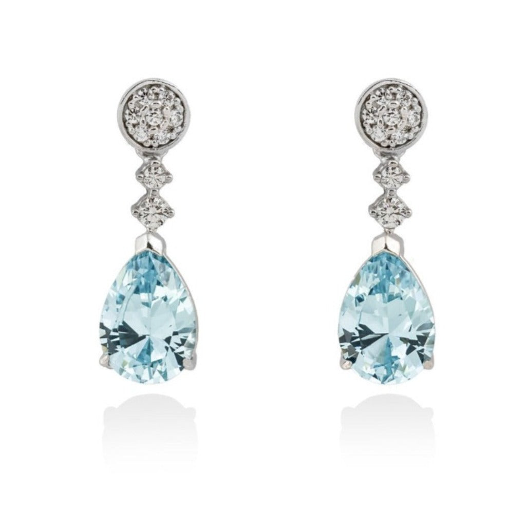 Pendientes de plata de primera ley (925) con baño de rodio con circonita incolora y piedra sintética color aguamarina