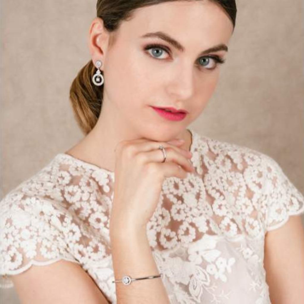 Pulsera semi rígida de plata de primera ley (925) con baño de rodio y circonita incolora