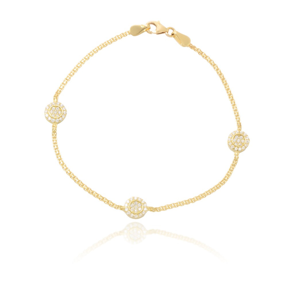 Pulsera realizada en oro amarillo de 18 quilates con motivos circulares cuajados con circonitas. Joyería Pamplona