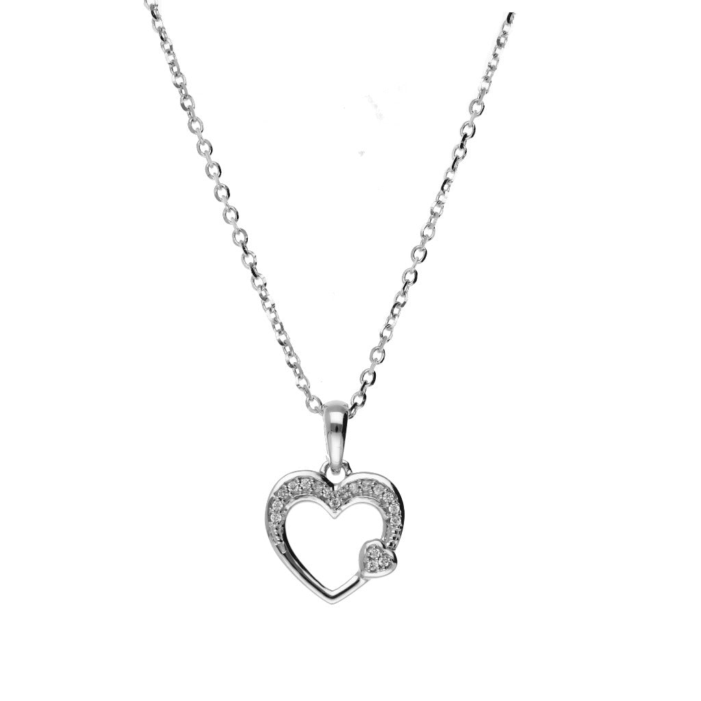 colgante corazón en oro blanco 18kt con diamantes. Pamplona