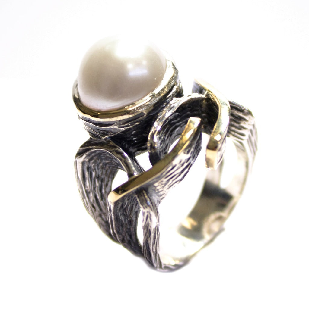 Anillo de plata de primera ley, oro de 9 quilates y perla cultivada. Colección Styliano Jewellery. Joyería Pamplona.