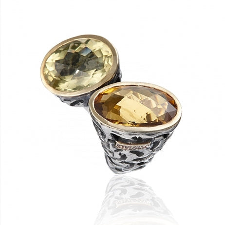 Anillo realizado en plata de primera ley (925) y oro 9 de quilates, cuarzo whisky y cuarzo golden.