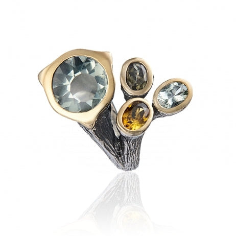 Anillo realizado en plata de primera ley (925) y oro 9 de quilates, amatistas verdes y turmalinas multicolor.. Styliano Navarra