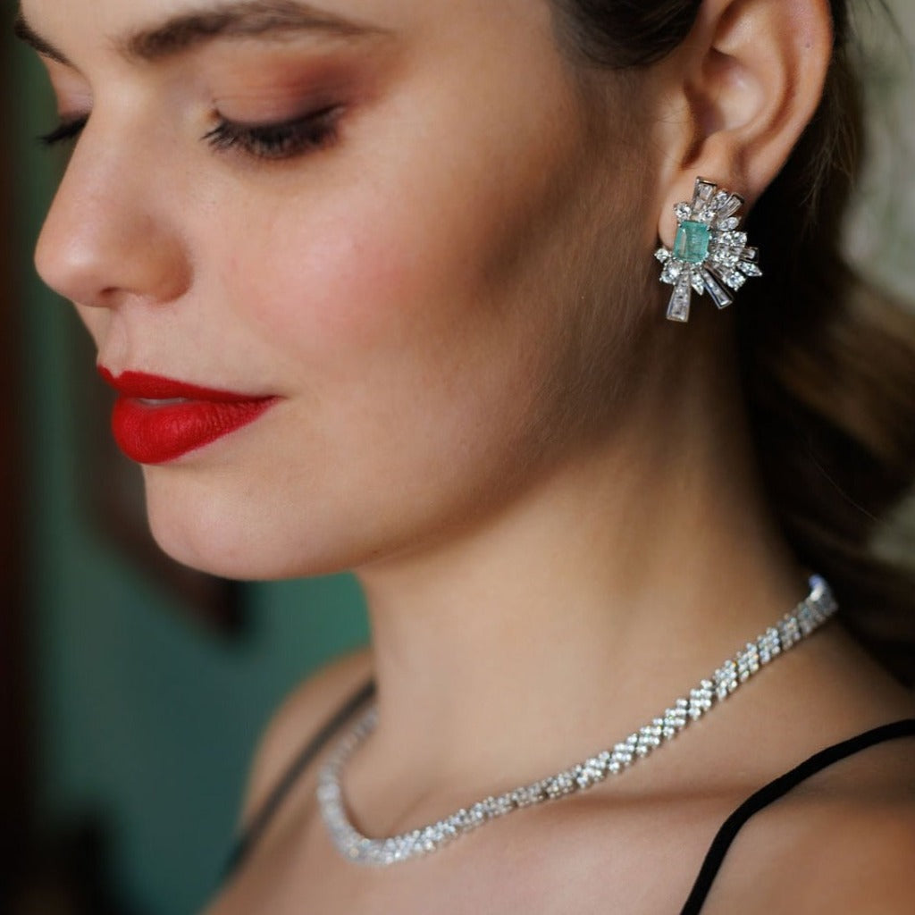 Pendientes originales de plata con piedra verde.