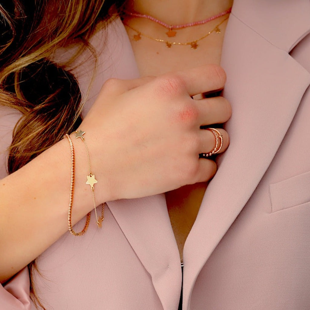 Pulsera en oro rosa de 18 quilates riviere engarzada 99 diamantes. Joyería Pamplona.