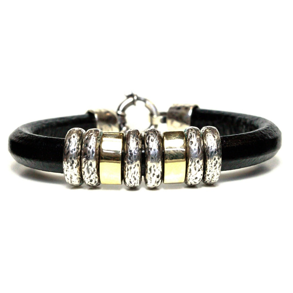 Pulsera para caballero de oro y plata. Cuero negro. Pulsera de hombre. Joyería Pamplona.