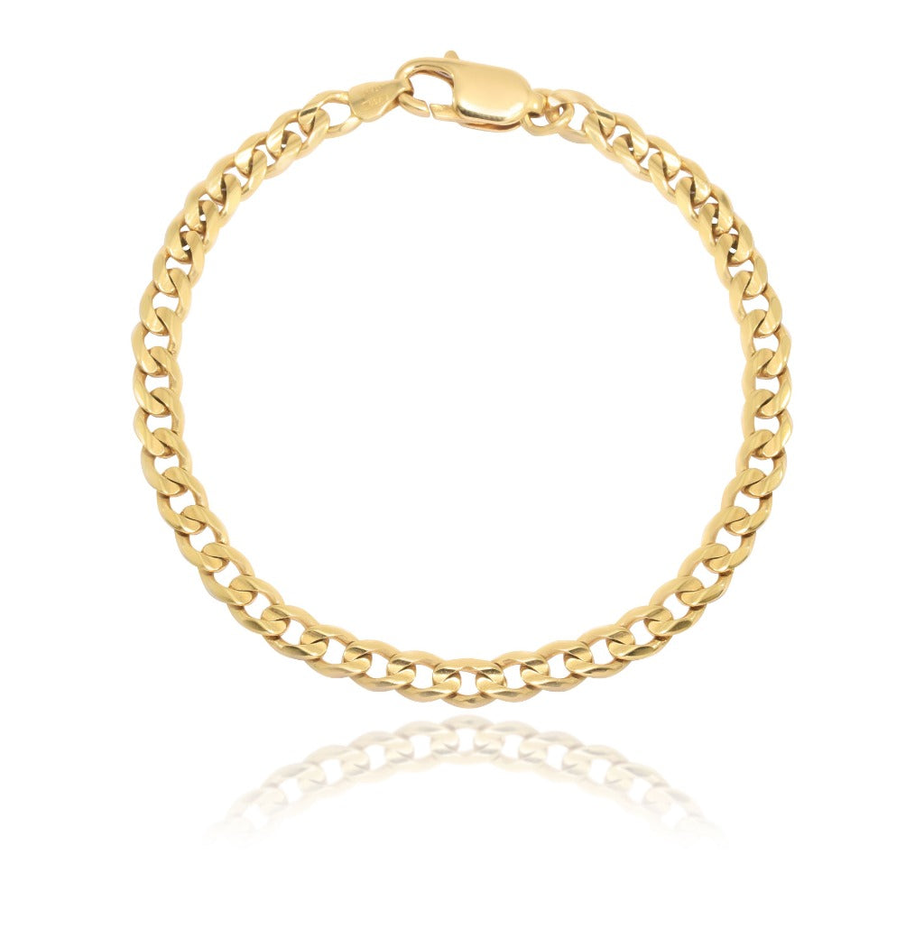 Pulsera barbada realizada en oro amarillo de 18 quilates. 