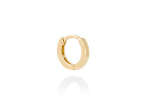 Small yellow gold hoop piercing 